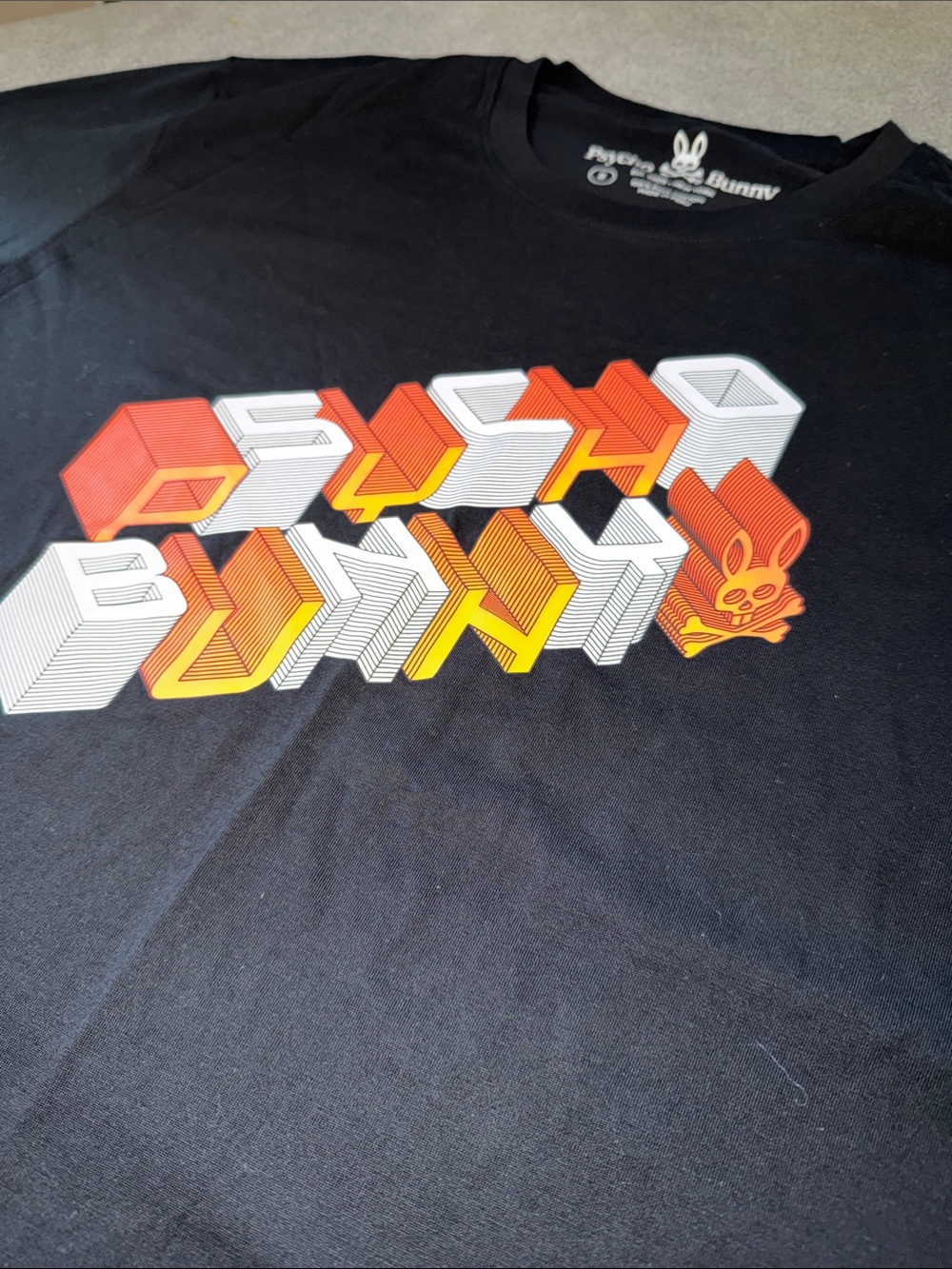 Psycho Bunny Black Tee with Yellow & White Geometric Print